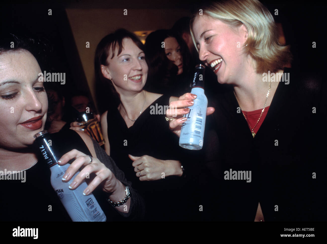 Young women on the town drinking alcohol during a hen night party in Leeds UK Stock Photo