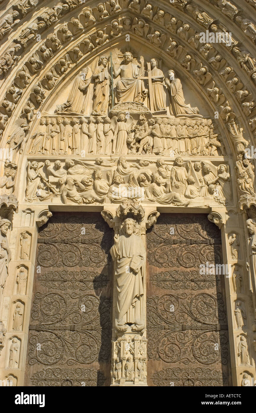 Paris, France. Notre Dame Cathedral. Detail of carved figures in the central portal above the main door or Porte de Jugement Stock Photo
