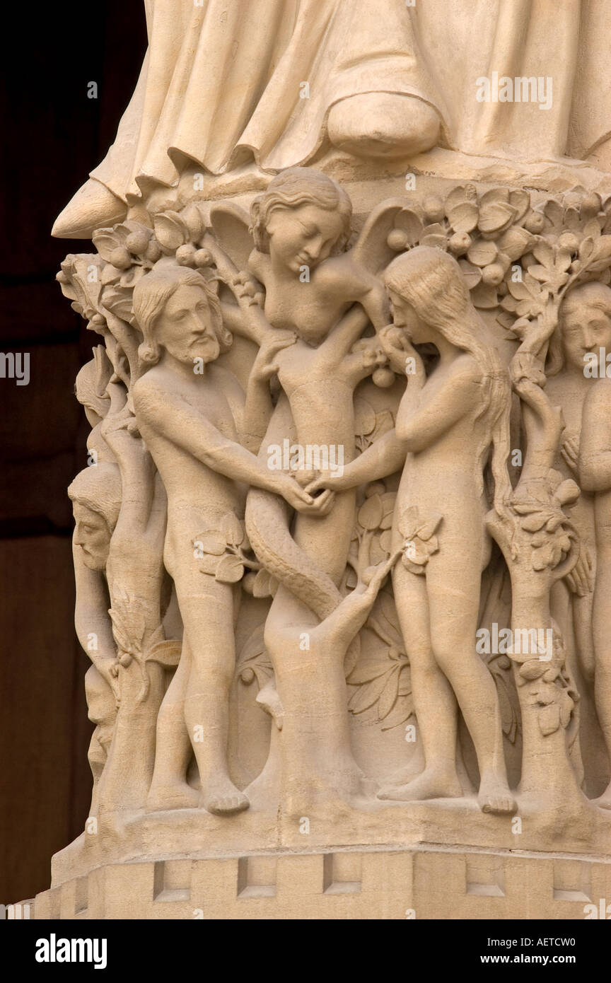 Paris, France. Notre Dame Cathedral. Detail of carved figures depicting The Fall in the Garden of Eden Stock Photo