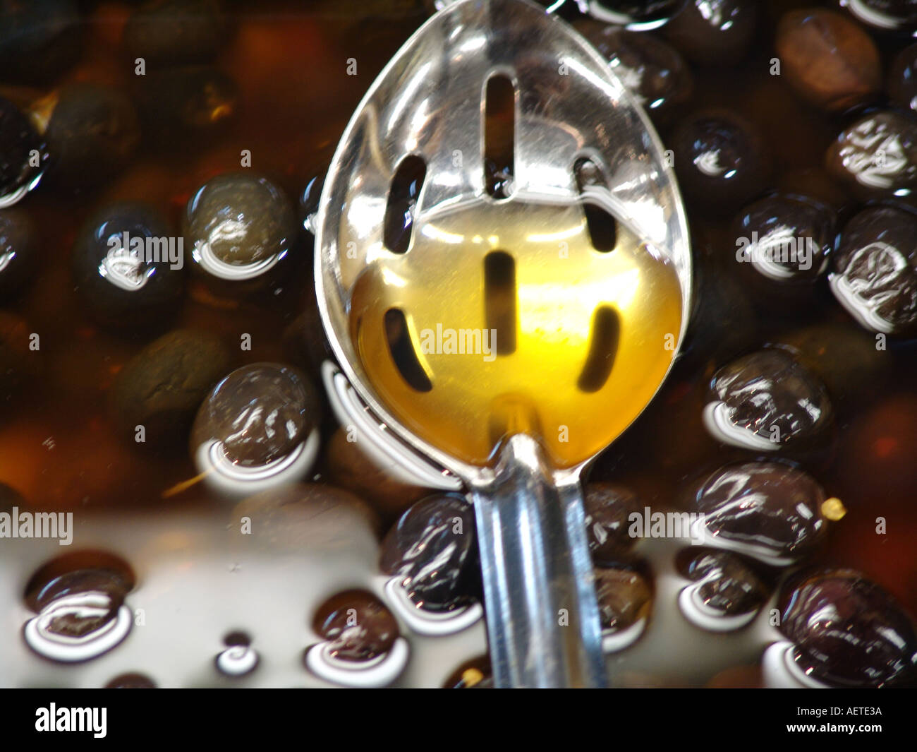 olives in oil Stock Photo