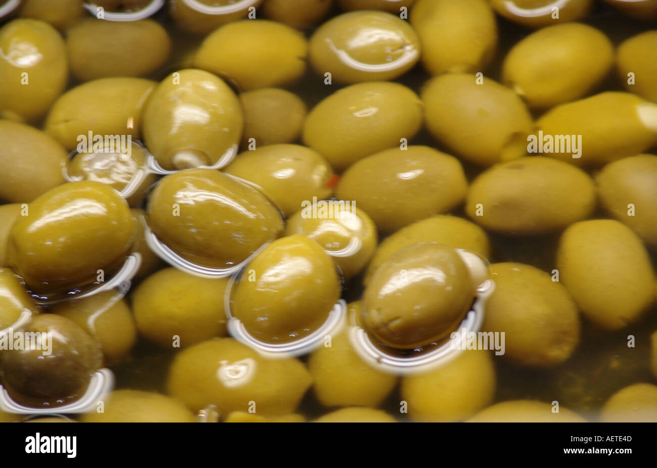 green olives in bulk Stock Photo Alamy