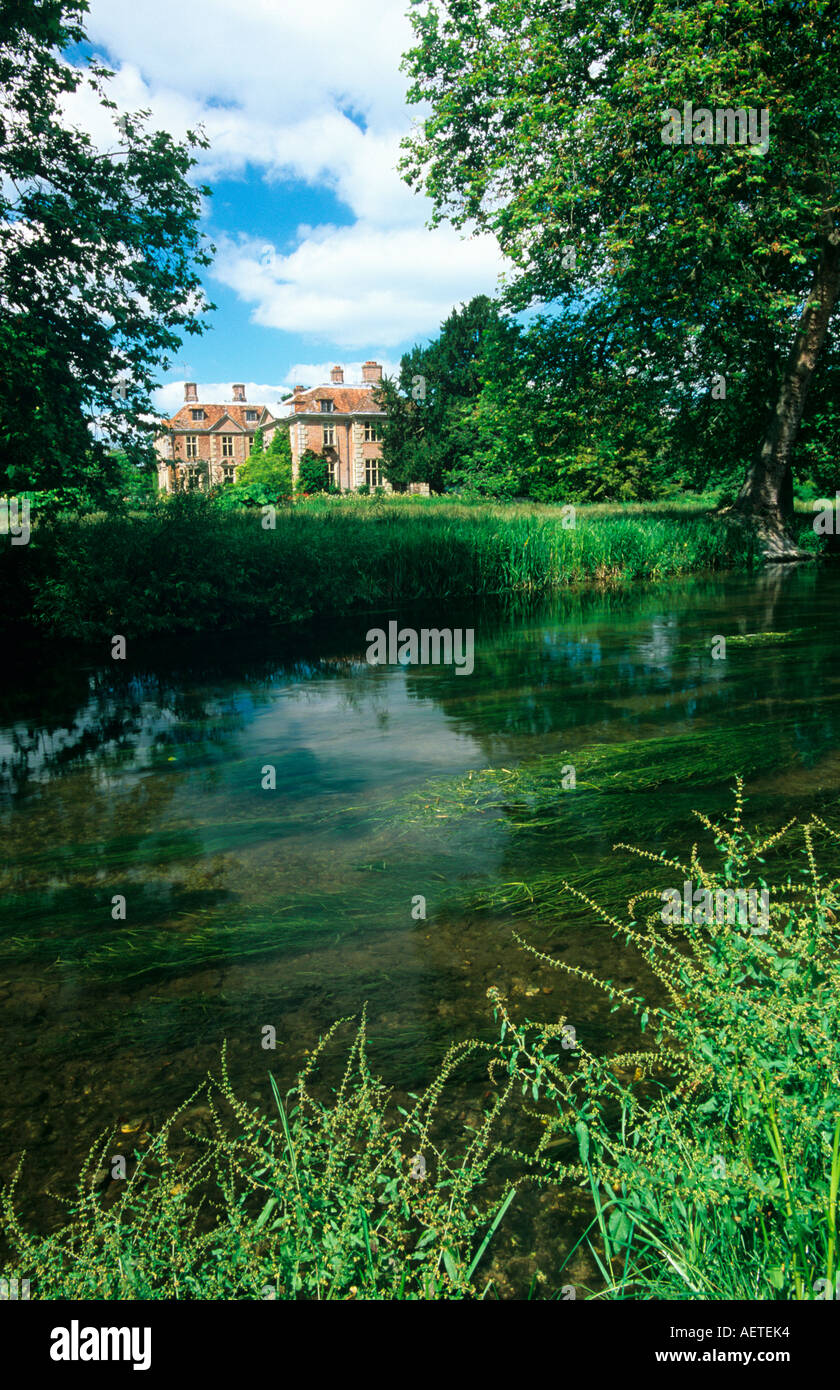 View of Heale house across the river Avon, Woodford valley, near Salisbury, Wiltshire, England, UK Stock Photo