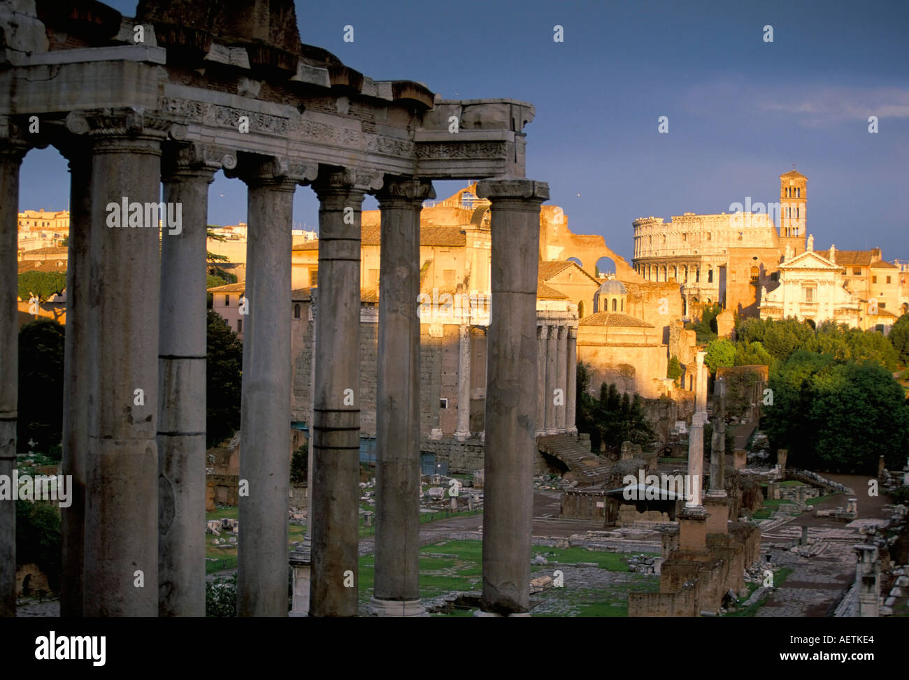 View across Roman Forum towards Colosseum and St Francesca Romana Rome Lazio Italy Europe Stock Photo
