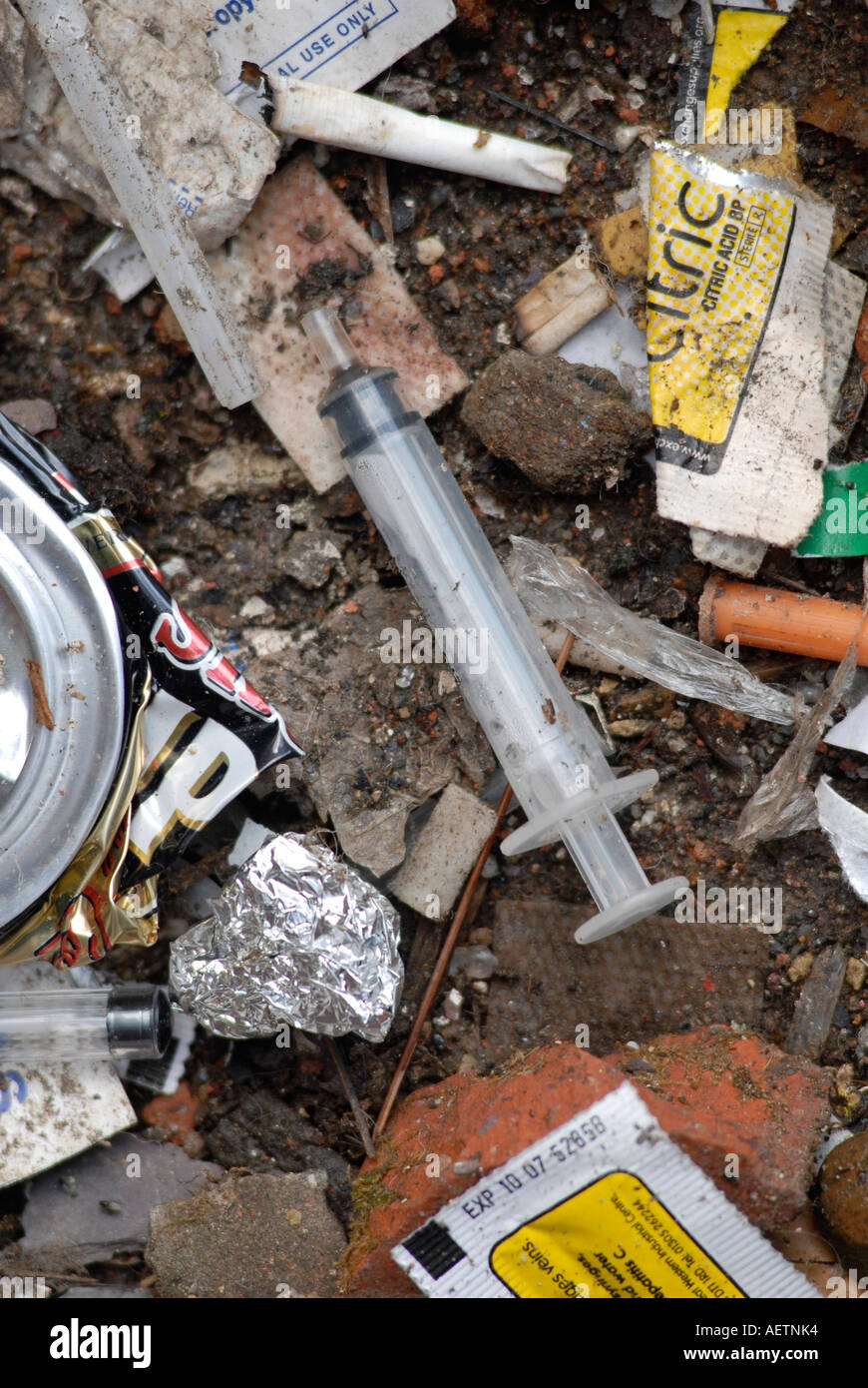 Discarded drug taking paraphenalia at a users den in smack alley Derby UK Stock Photo