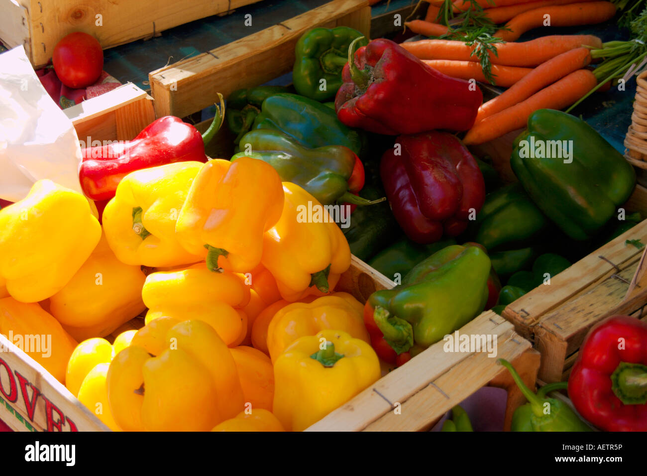 Red green and yellow peppers for sale on a typical French Market in the ...