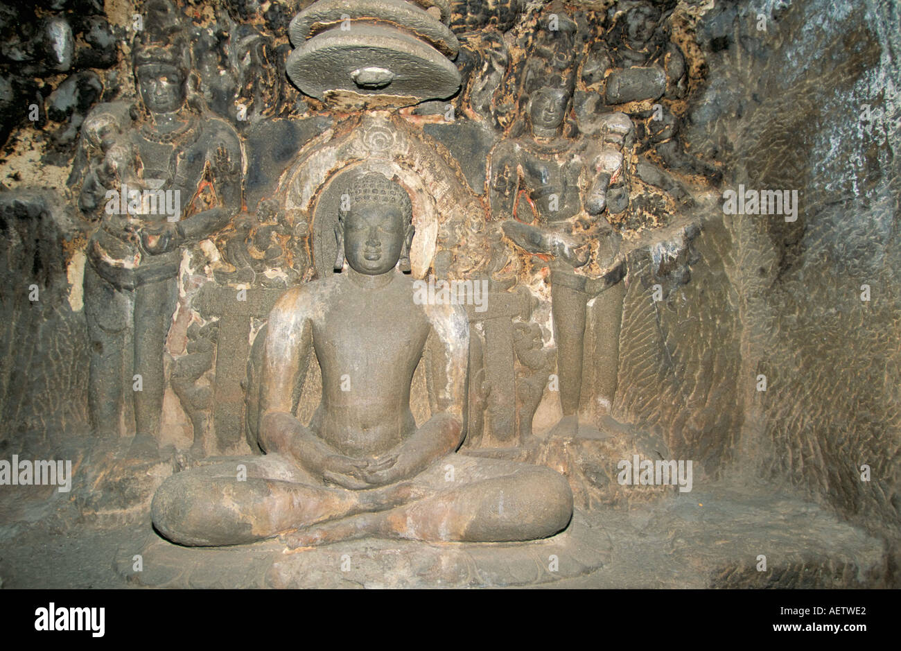 Statue of Mahavira founder of the Jain religion in the Indra Sabha Cave 32 in Jain section of the cave temples of Ellora UNESCO Stock Photo