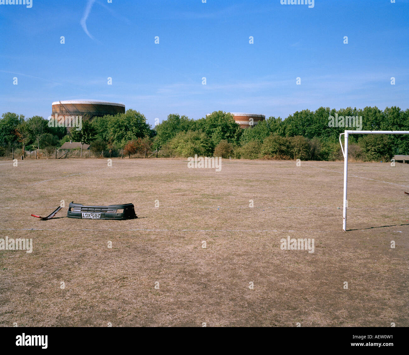 Inner city football pitch in front of gas holders with the front bumper