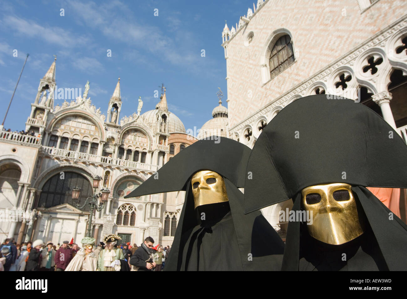 masked faces and costumes at the Venice Carnival St Marks Square Venice ...