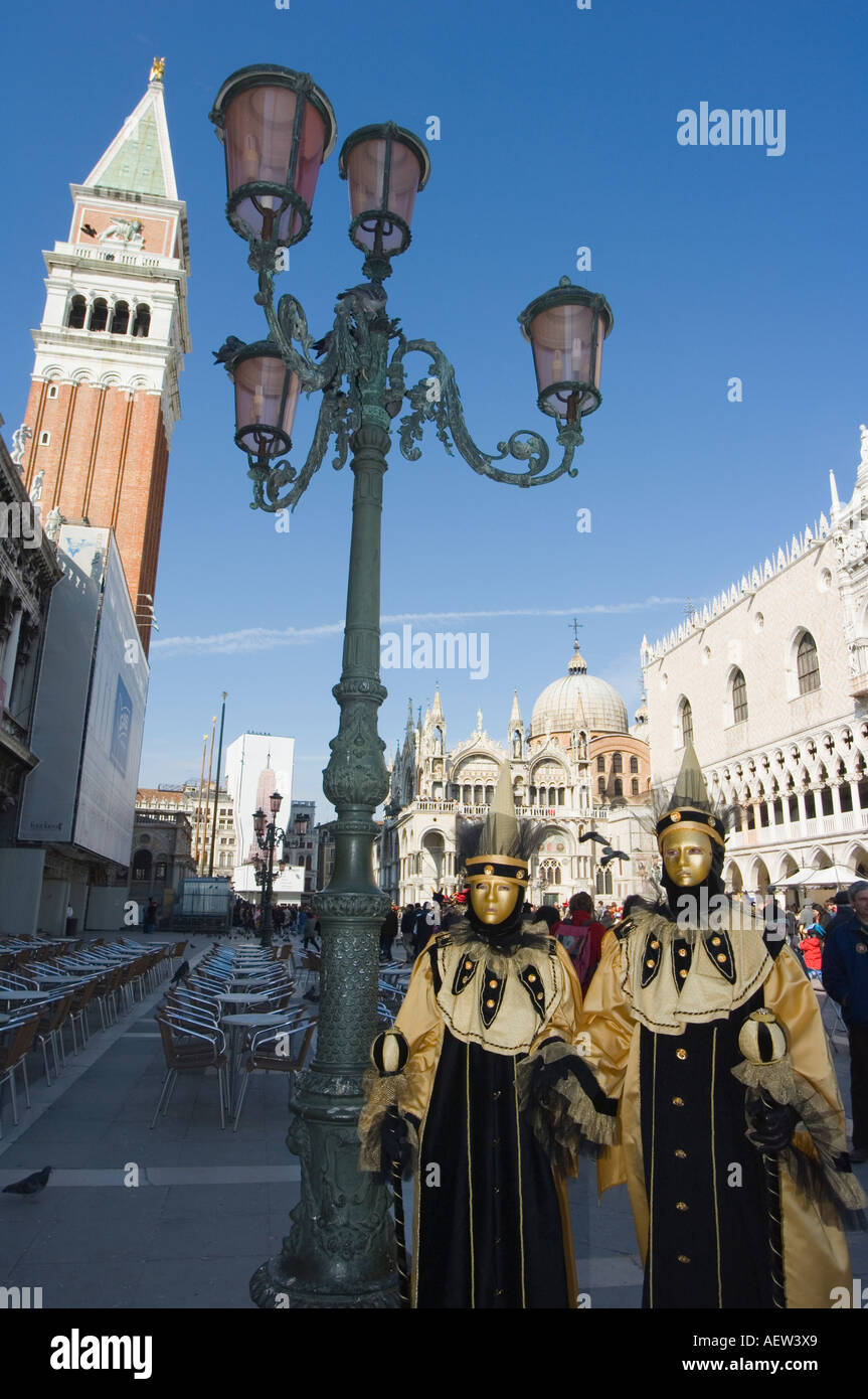 masked faces and costumes at the Venice Carnival St Marks Square Venice ...