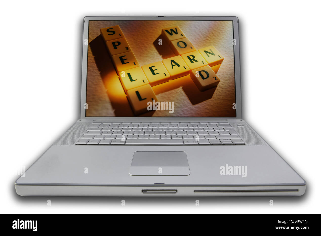 LAP TOP COMPUTER WITH SCRABBLE LETTERS ON SCREEN SPELLING WORDS SPELL