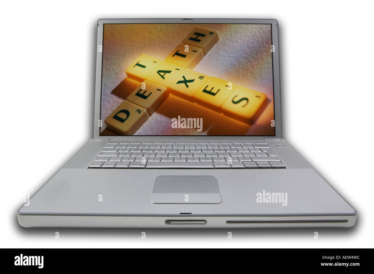 LAP TOP COMPUTER WITH SCRABBLE LETTERS ON SCREEN SPELLING WORDS DEATH TAXES Stock Photo