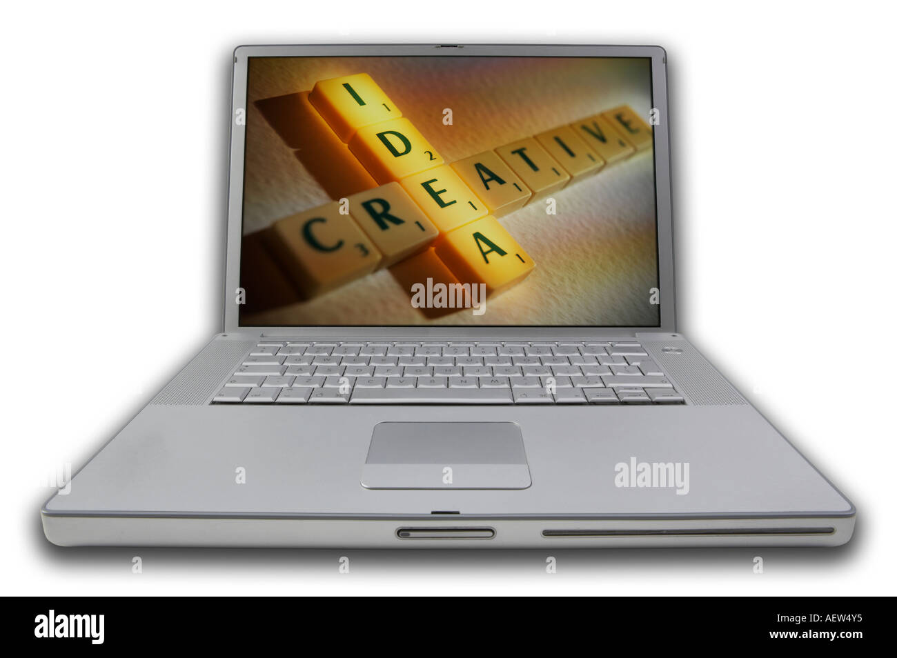LAP TOP COMPUTER WITH SCRABBLE LETTERS ON SCREEN SPELLING WORDS IDEA CREATIVE THINK Stock Photo