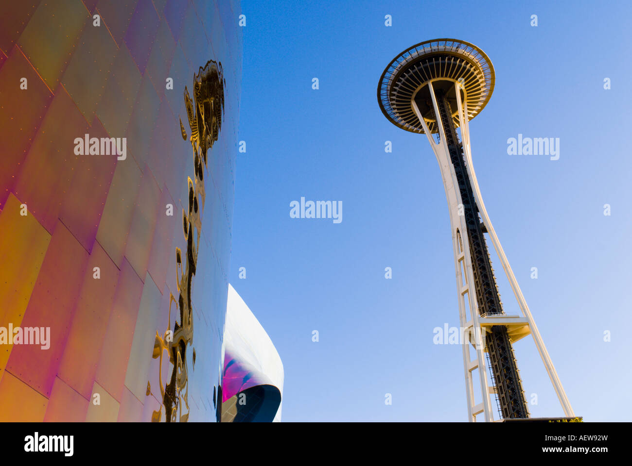 The Space Needle and metal sculpture at the Experience Music Project Seattle Washington Stock Photo