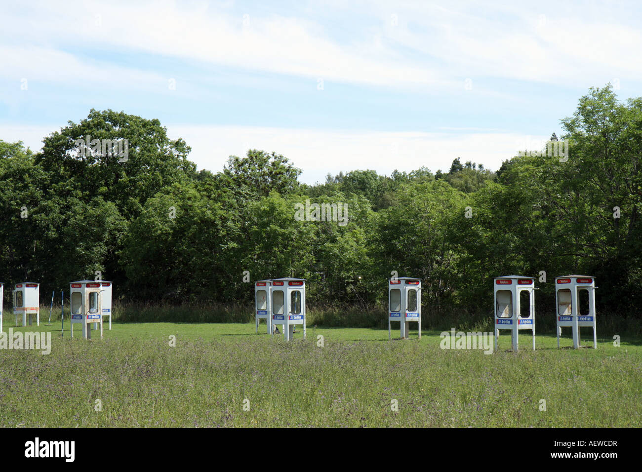 Field of scrapped phone booths as obstacles at the football golf course at Mix Ranch, Gotland, Sweden Stock Photo