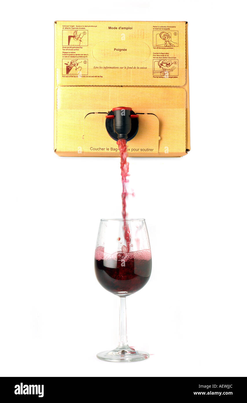Red Wine poured from a box in a wineglass Stock Photo