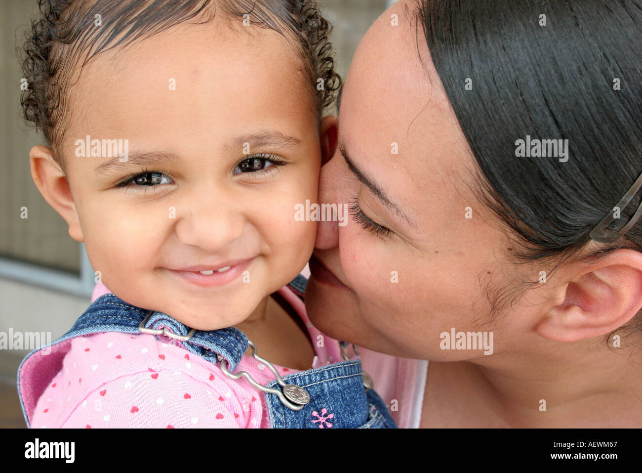 Miami Florida,Liberty City,Haitian mother,mom,adult adults woman women female lady,daughter,girl girls,youngster youngsters youth youths kid kids chil Stock Photo