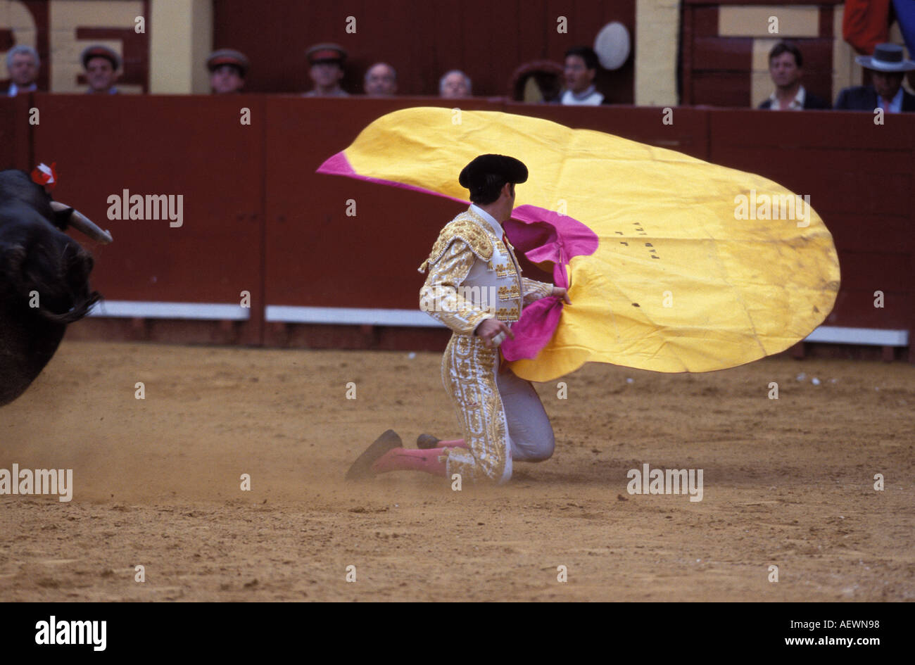 Bullfighter and bull in the arena last of a 3 picture sequence Stock Photo