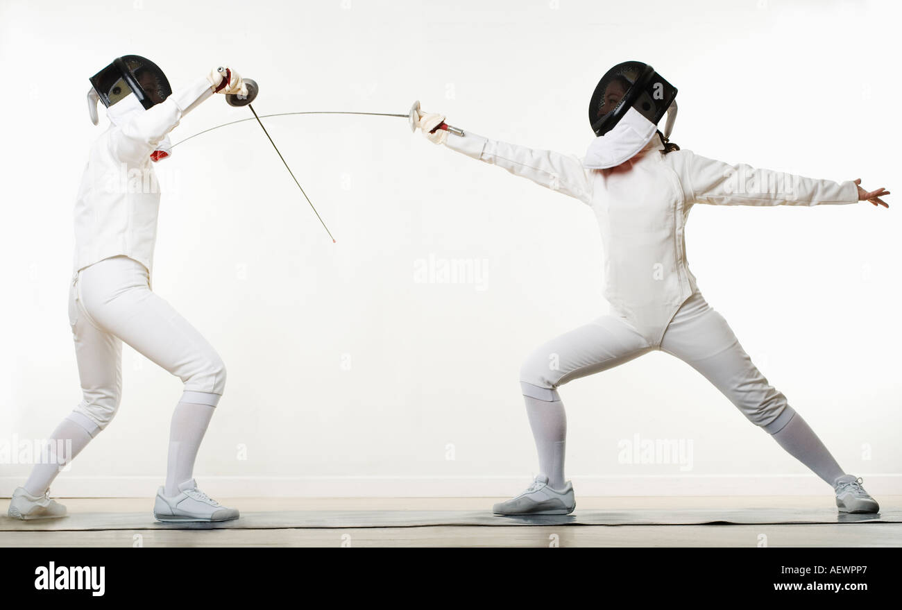 two people fencing Stock Photo