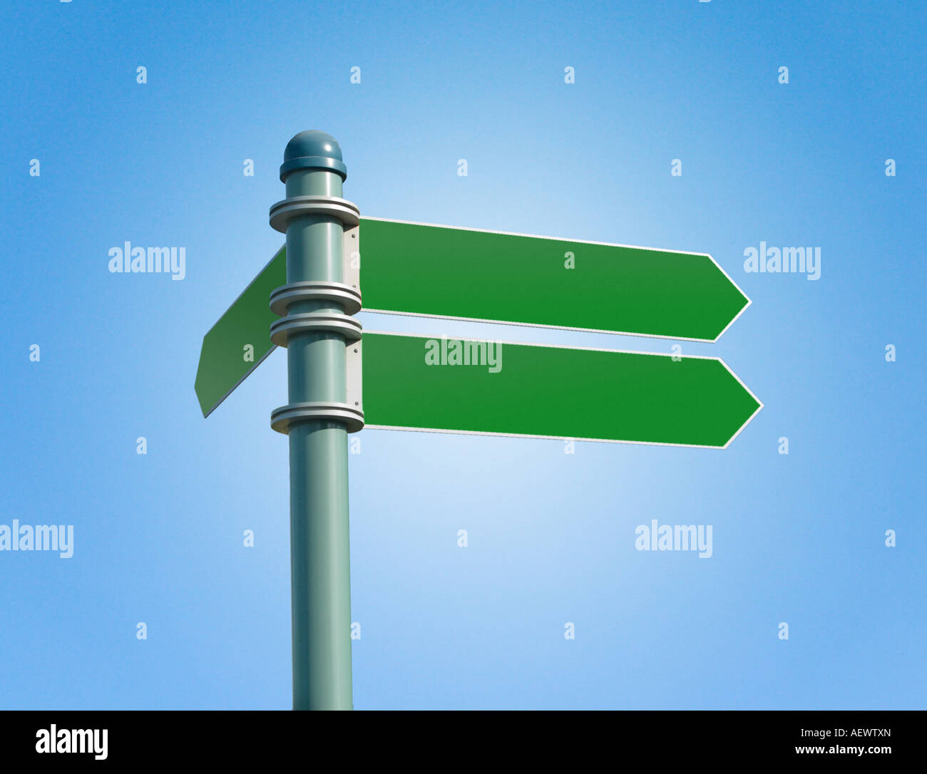 Customizable green street sign on a clear blue sky Stock Photo