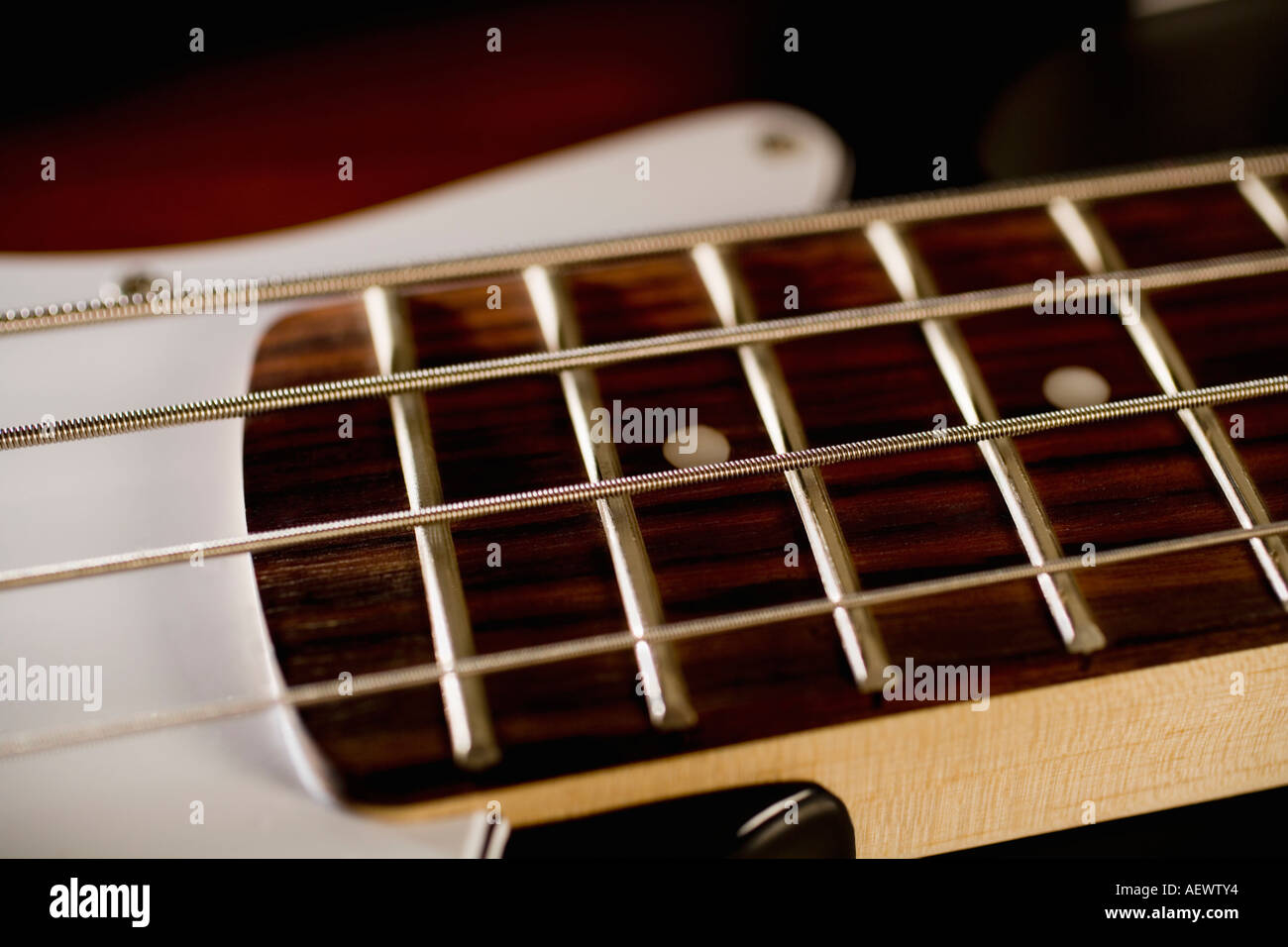 Strings on a bass guitar Stock Photo Alamy