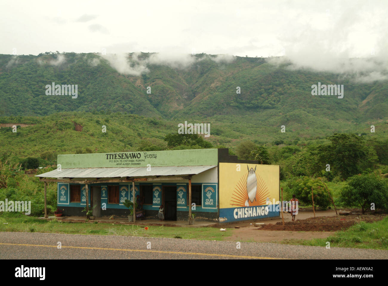 A rural grocery store at the foot of Livingstonia. Advertising for chisango Malawian brand of Condom. Livingstonia, Malawi. Stock Photo