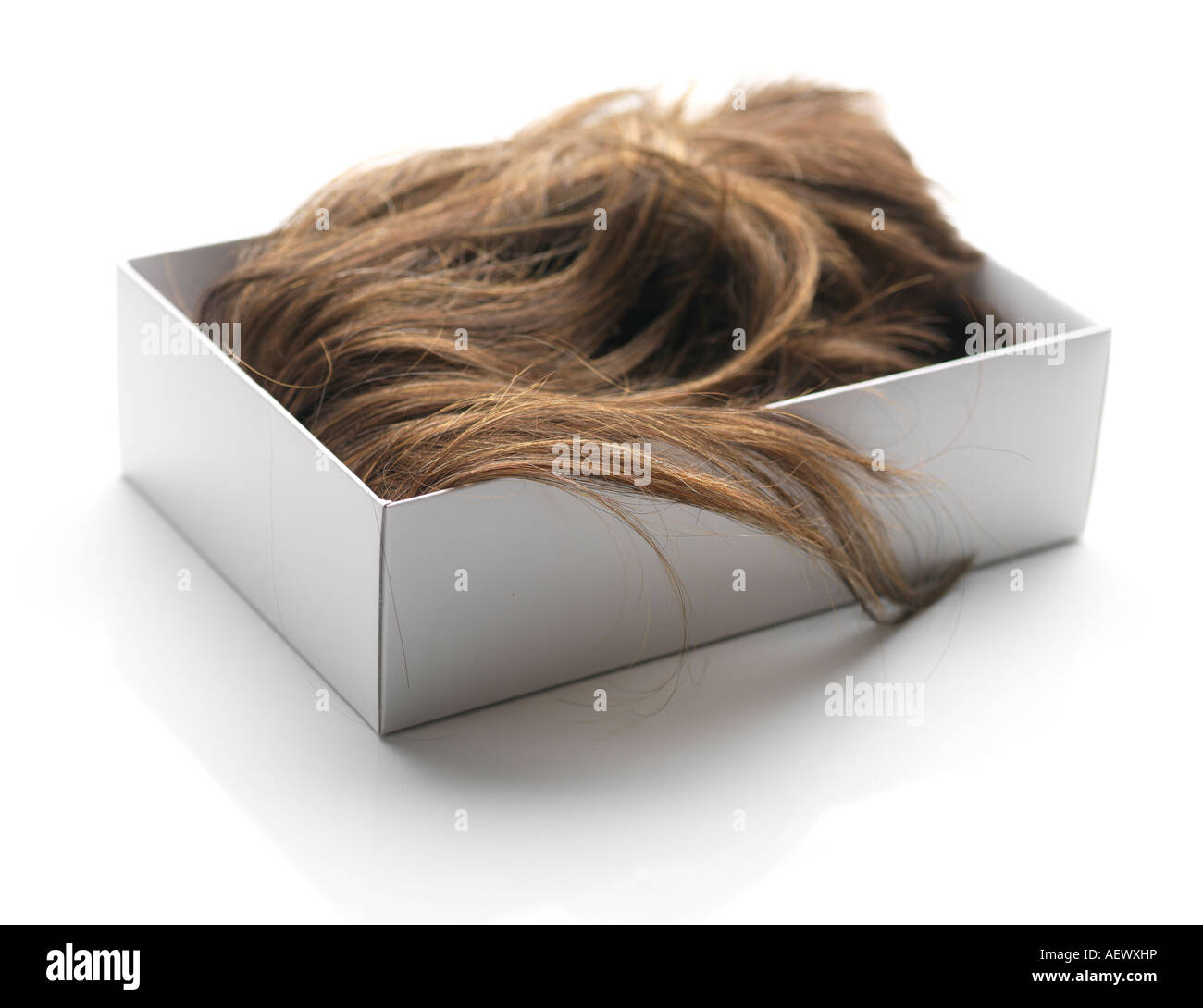 a wig in a box Stock Photo - Alamy