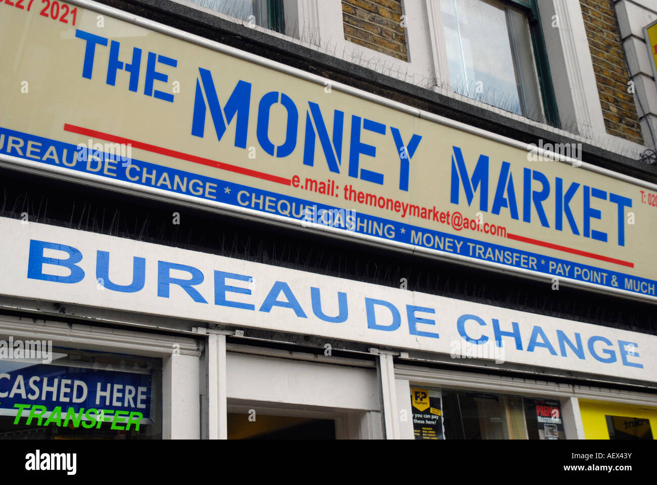 Money Market sign on exterior of bureau de change Stock Photo