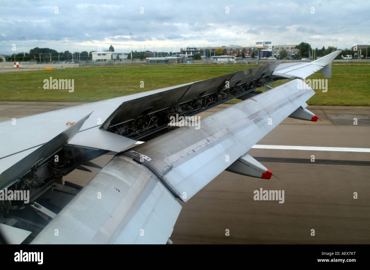 British Airways A320 Airbus landing Wing equipment and flaps on landing Stock Photo