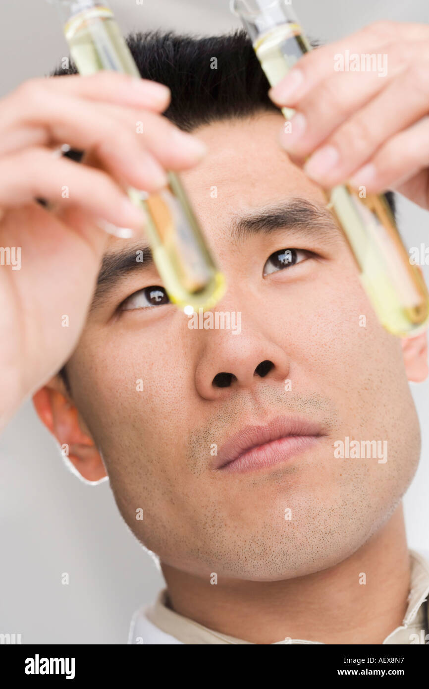 Scientist conducting an experiment Stock Photo