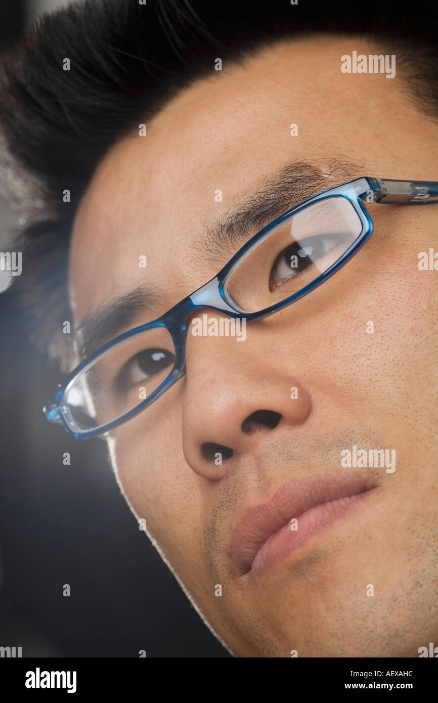 Asian man wearing glasses posing hi-res stock photography and images ...