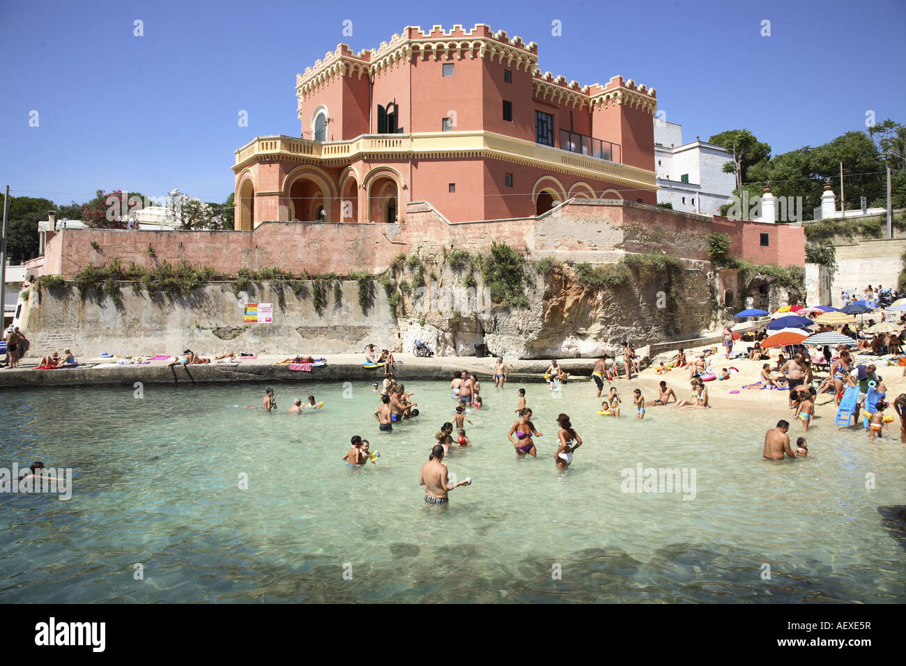 Santa Maria di Leuca, Puglia, Italy, people on the beach having a bath during the summer season Stock Photo
