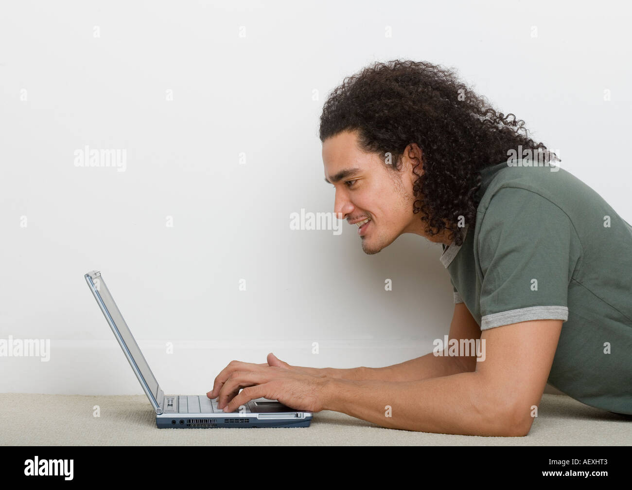 Man using a laptop computer Stock Photo