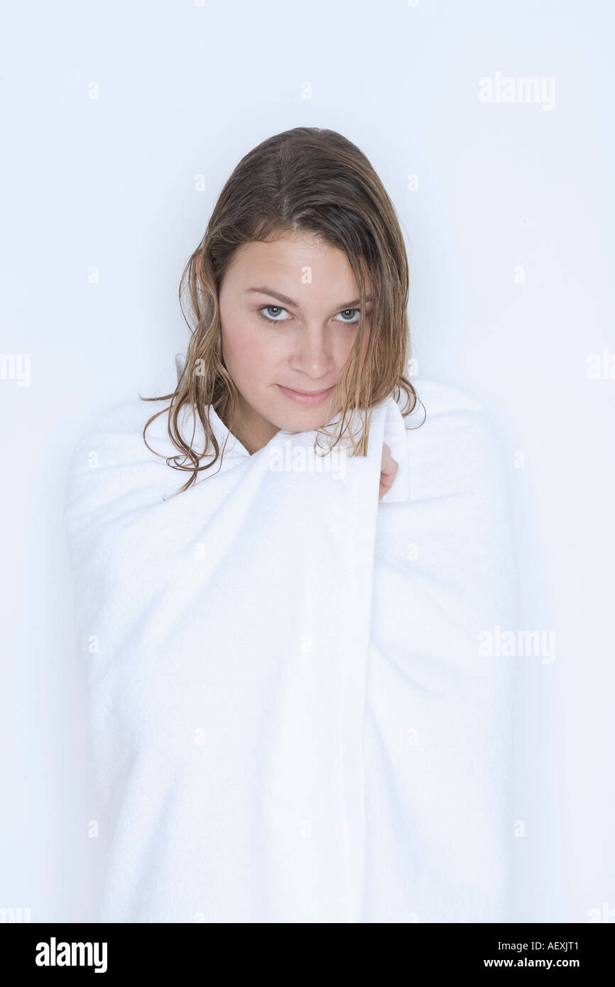 Woman with wet hair wrapped in towel Stock Photo Alamy
