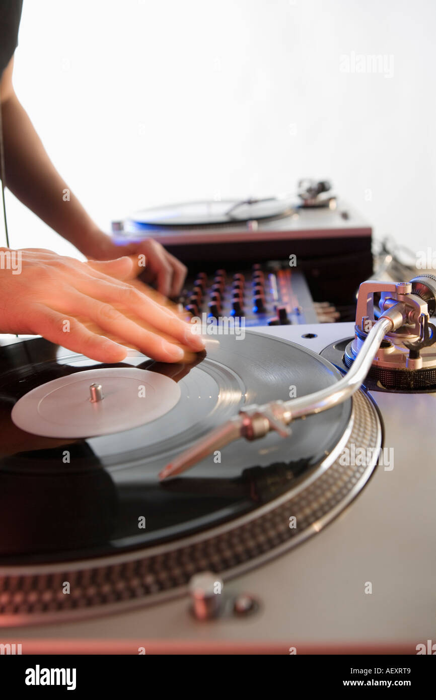 Person mixing sound from records Stock Photo