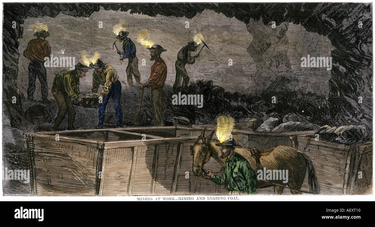 Miners digging and loading coal into an underground mule-drawn cart in Pennsylvania 1860s. Hand-colored woodcut Stock Photo