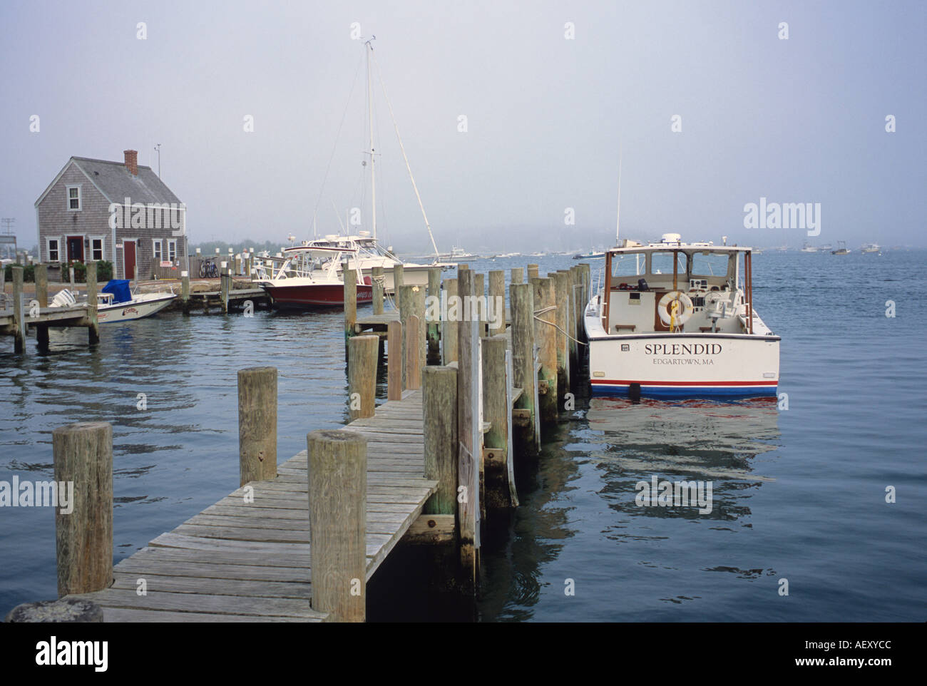 Dock with boat named "Spendid" on Martha s Vineyard Massachusetts