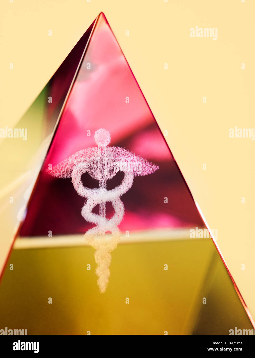 Close up of pyramid with Caduceus symbol in it Stock Photo