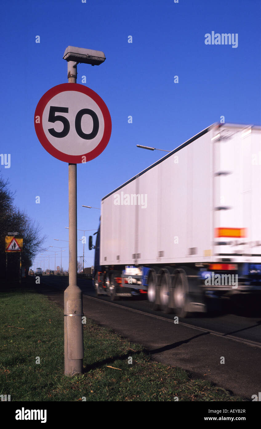 lorry passing 50 miles per hour speed limit warning sign on road in leeds yorkshire uk Stock Photo