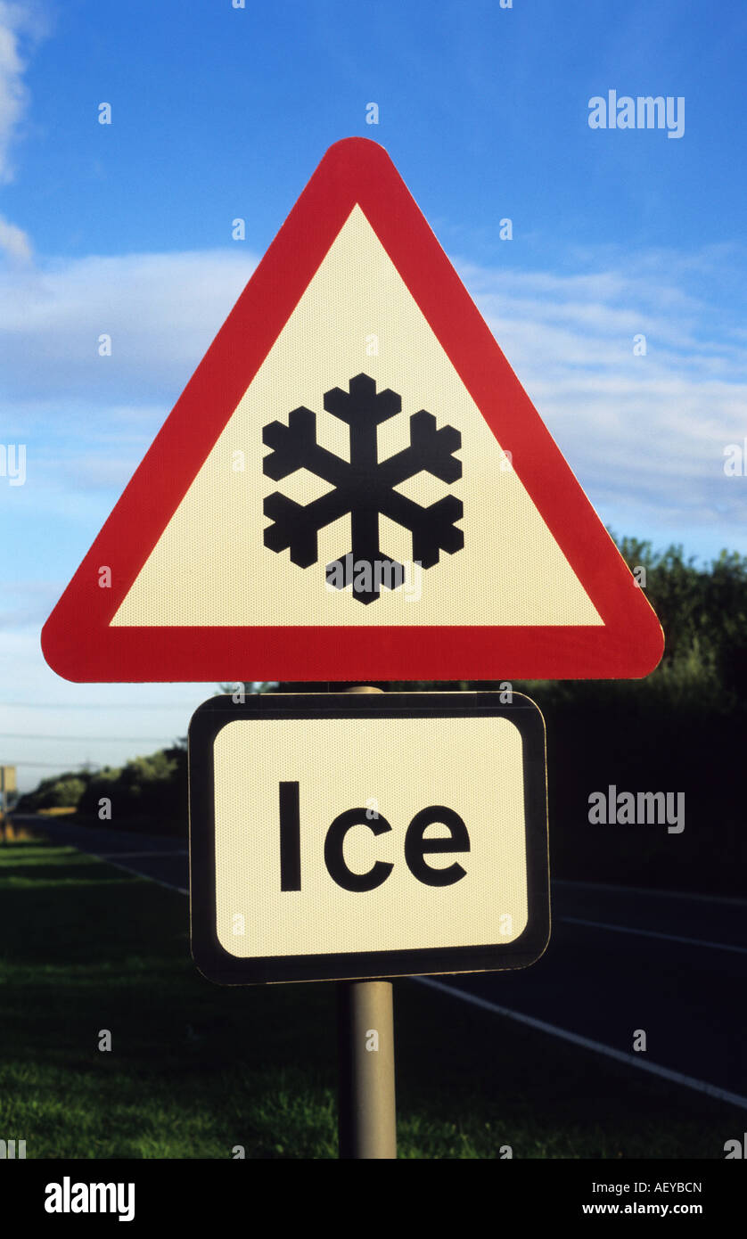 road sign warning of ice on country road uk Stock Photo