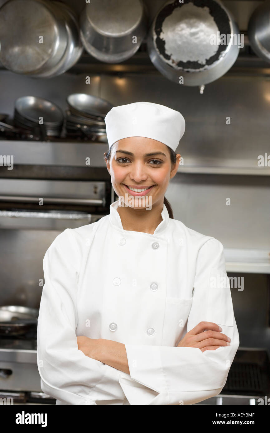 Female chef in restaurant kitchen Stock Photo - Alamy