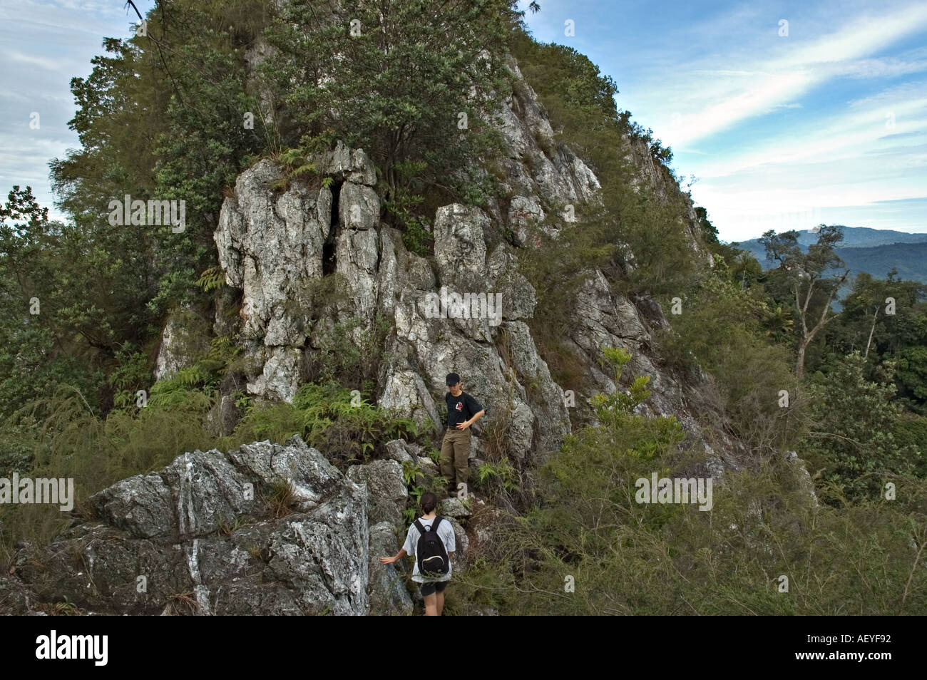 Hiking up the Bukit Tabur quartz rock ridge in Malaysia Stock Photo