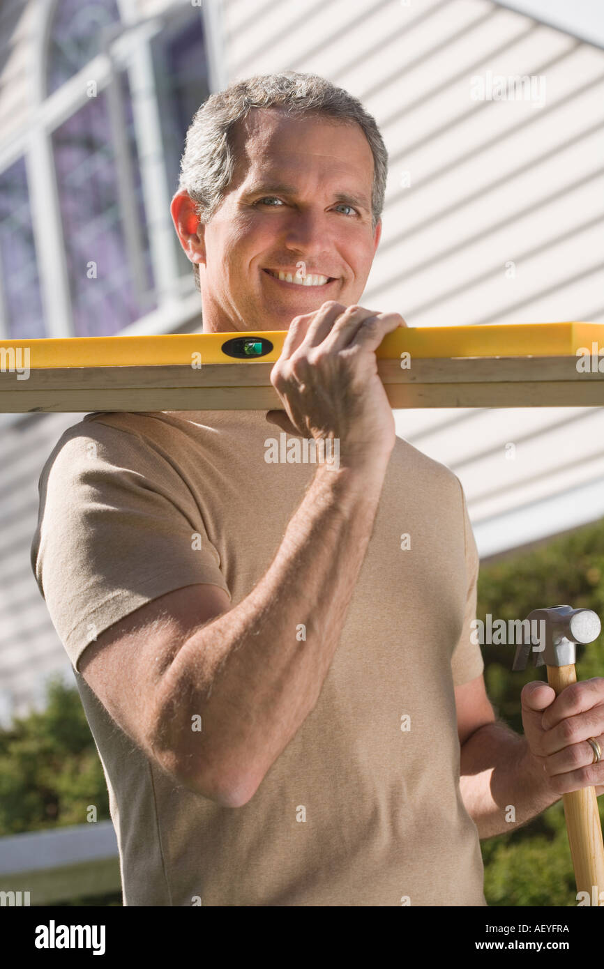 Man holding tools hi-res stock photography and images - Alamy