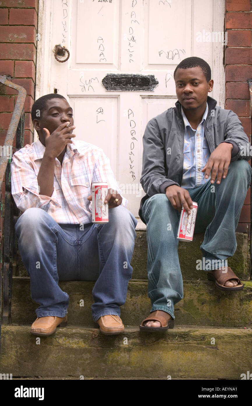 Black men drinking smoking on hires stock photography and images Alamy