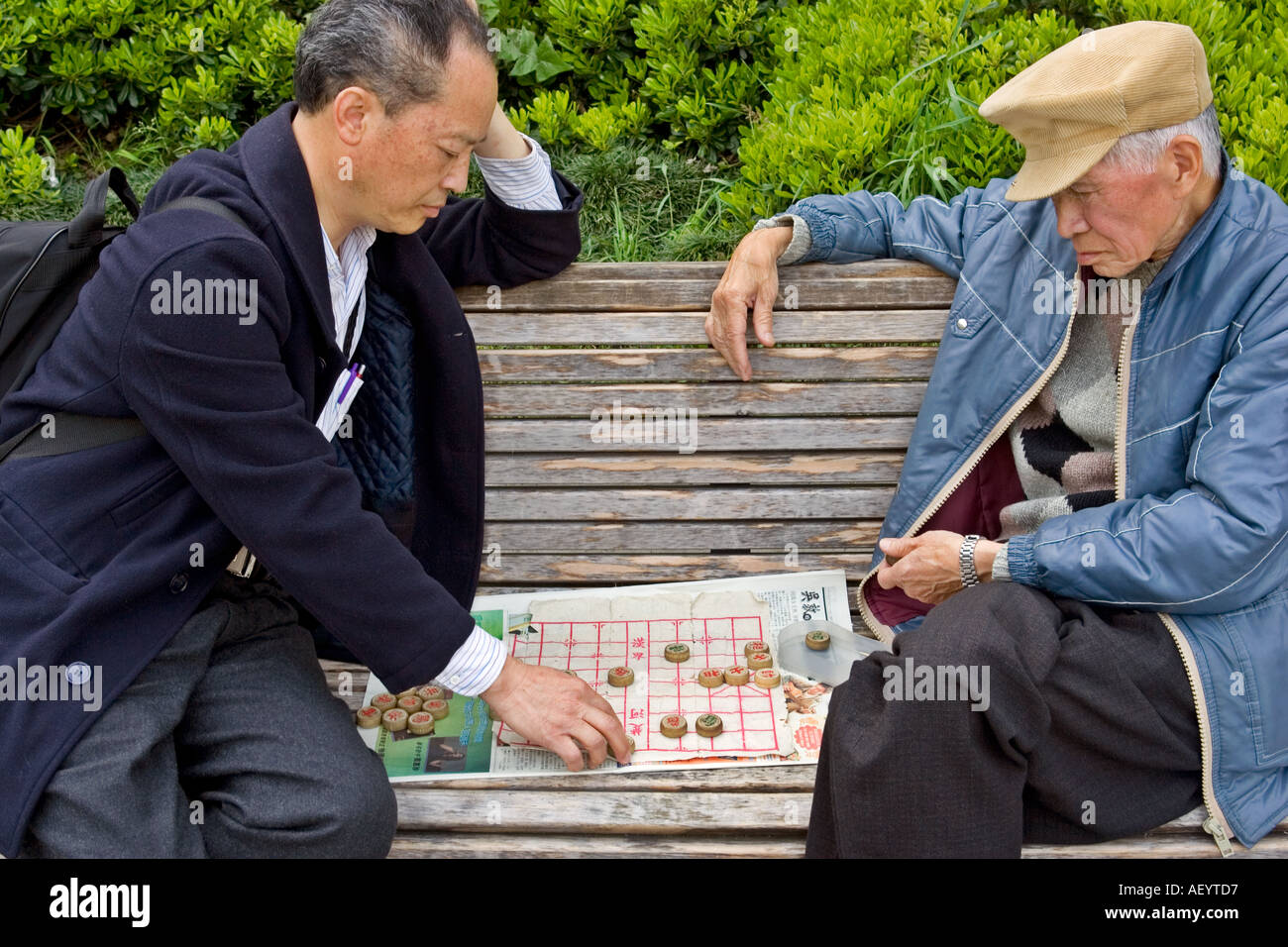 Two Asian men Playing Chinese Chess Stock Photo