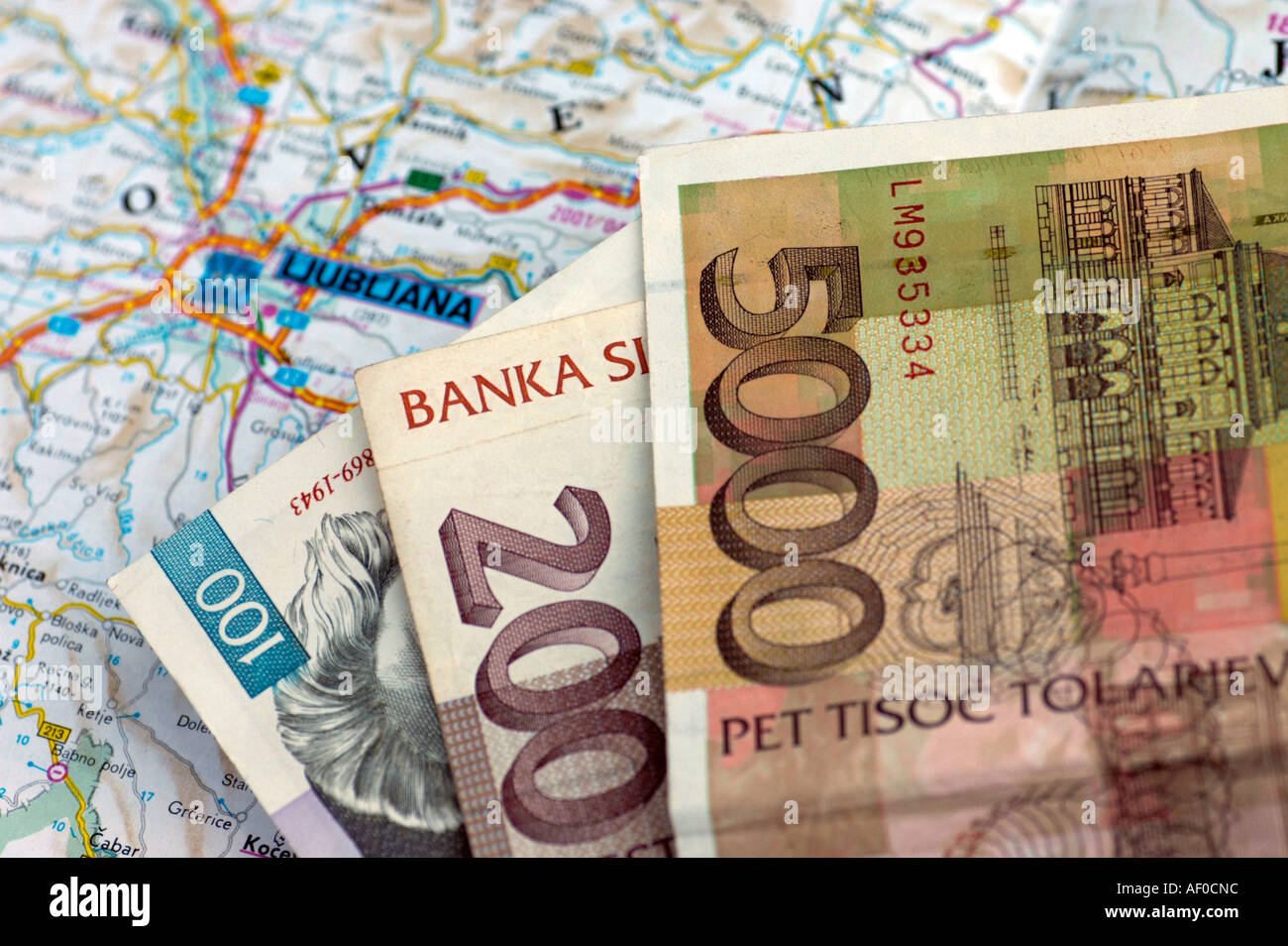 slovenian money currency Tollar on a map of Slovenia with Ljubljana