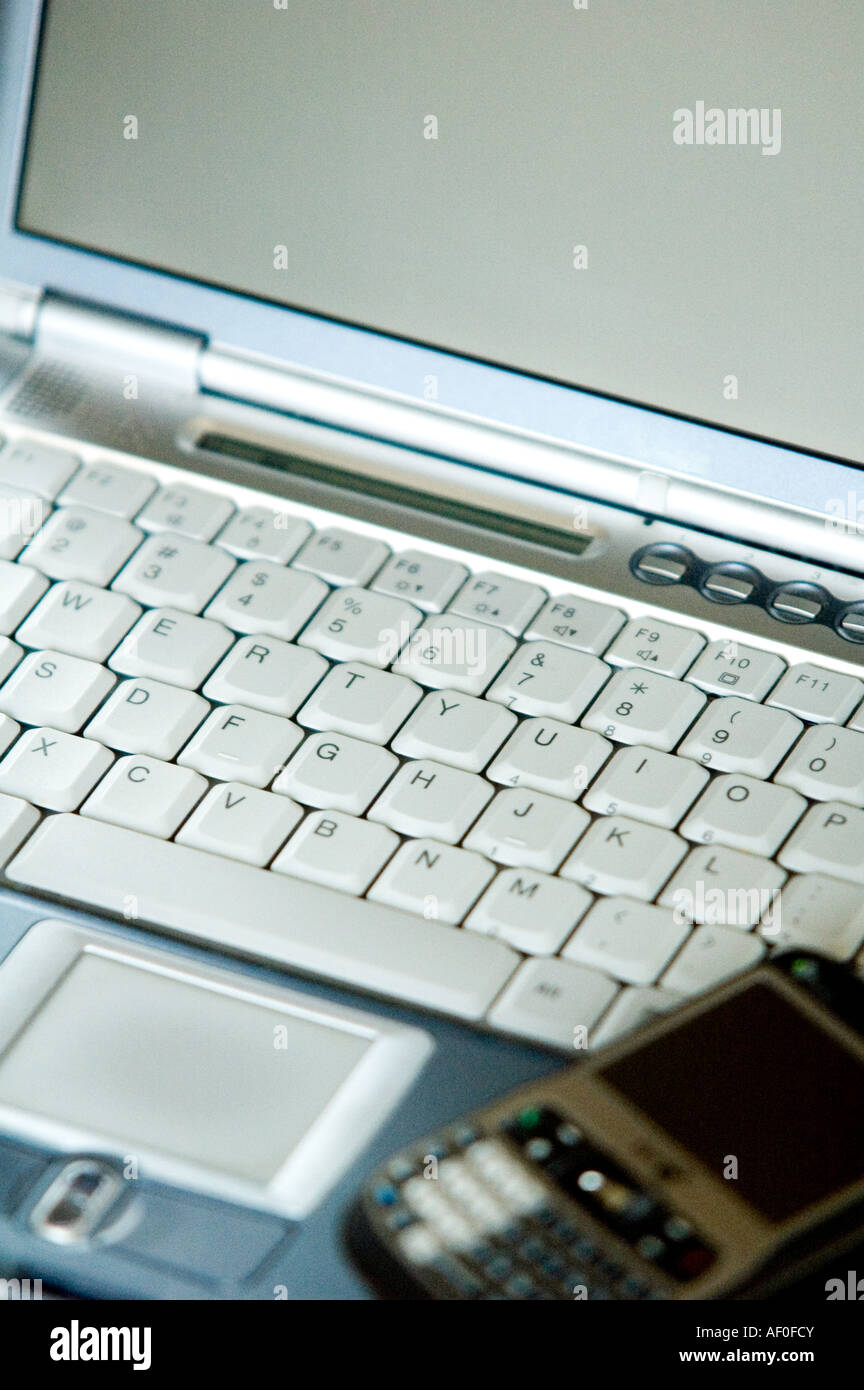 Laptop and PDA - Vertical - Close-up Stock Photo