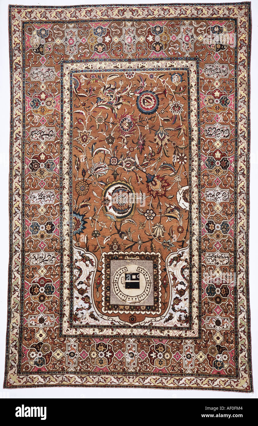 Silk carpet from 12 century having famous 144 knots per square centimeter, Konya Mevlana Museum, Turkey. Stock Photo