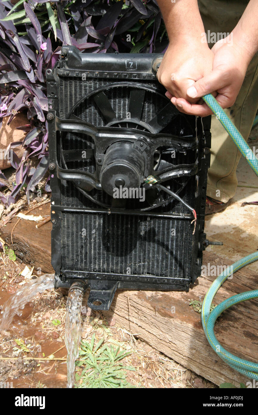 black metal water pump and hose Stock Photo Alamy