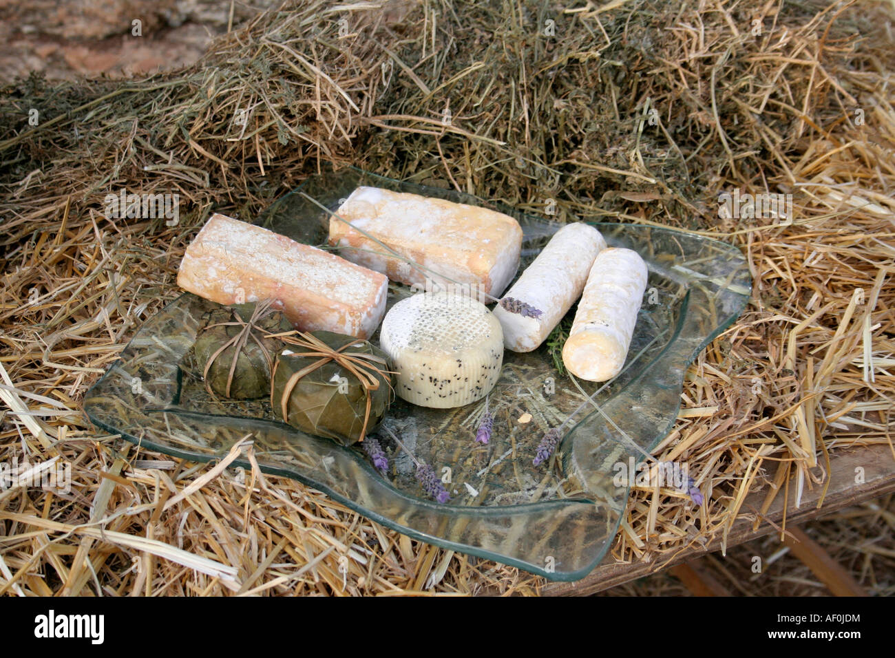 bread and cheese display on straw Stock Photo - Alamy