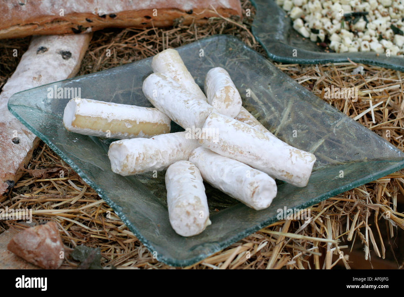 bread and cheese display on straw Stock Photo - Alamy